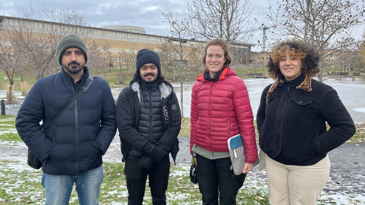 International student ambassadors by the campus pond at Umeå University
