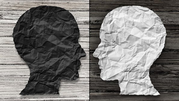 Schematisk bild av två ansikten mot varandra