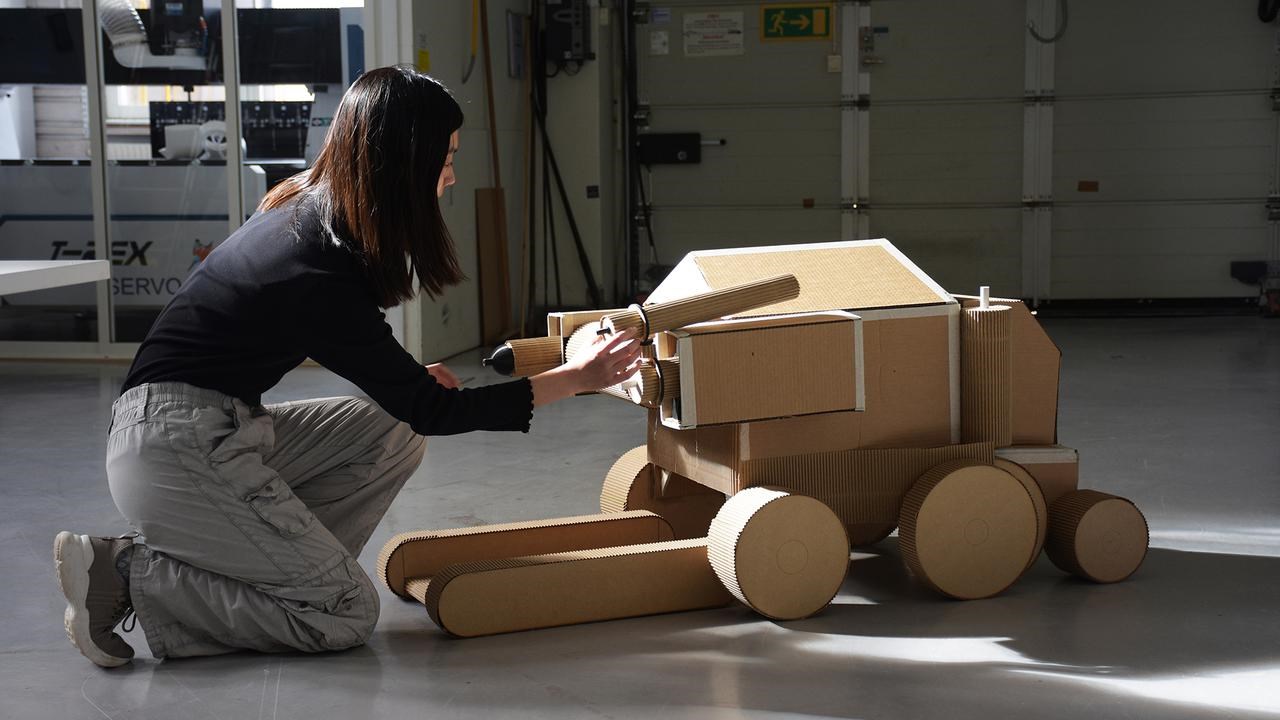 Jinying Cheng with a prototype of her design