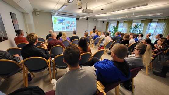 Audience during a talk on UMF.