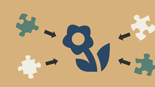 Flower with jigsaw puzzle bits around pointing towards to flower.