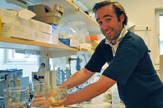 Owen Rowe working with samples from the mesocosms