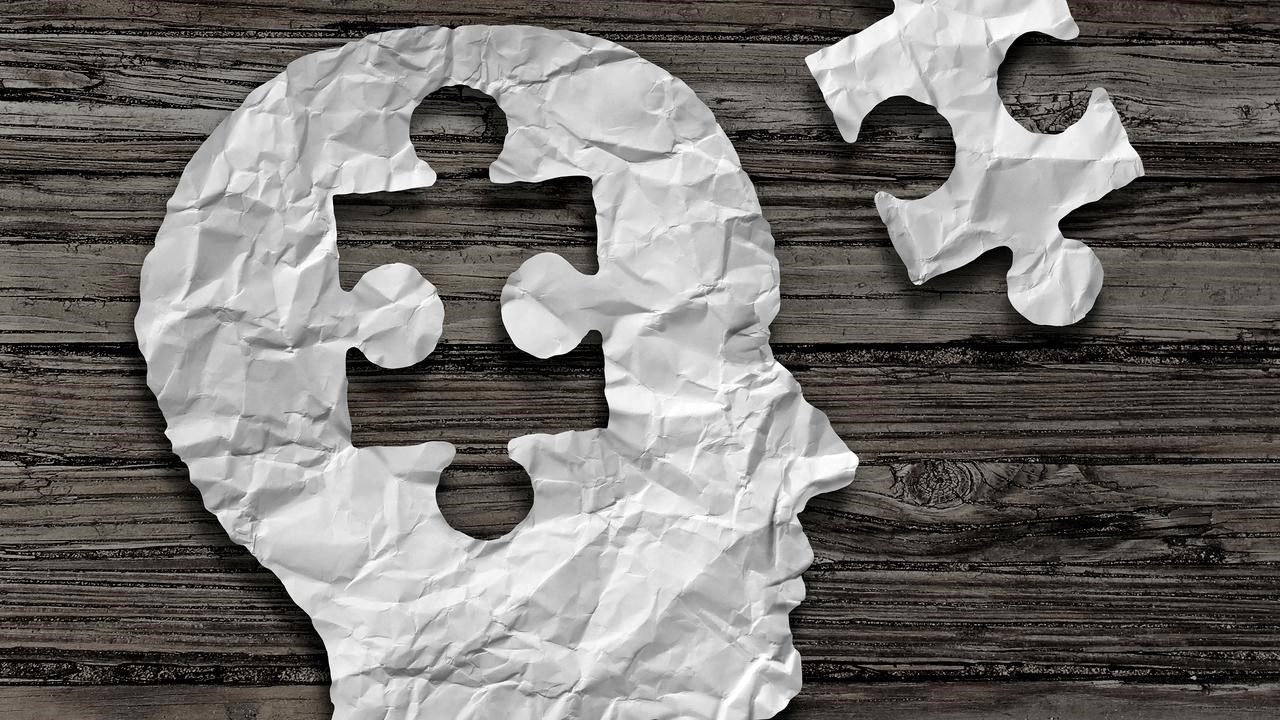 Genrebild på ett huvud i profil i papper där en pusselbit från hjärnan plockats ut och ligger bredvid. Kan illustrera sådanat som har med hjärnan att göra såsom intelligens, minne eller hjärnsjukdom.