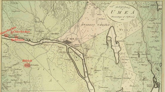 En gammal karta över en stad med en flod som rinner genom den.