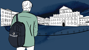 Person med Umeå universitetsväska anländer till ett äldre universitet.