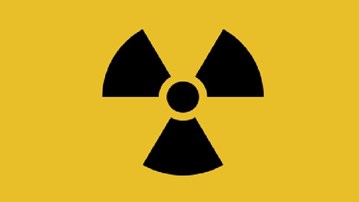 Symbol som varnar för strålning.