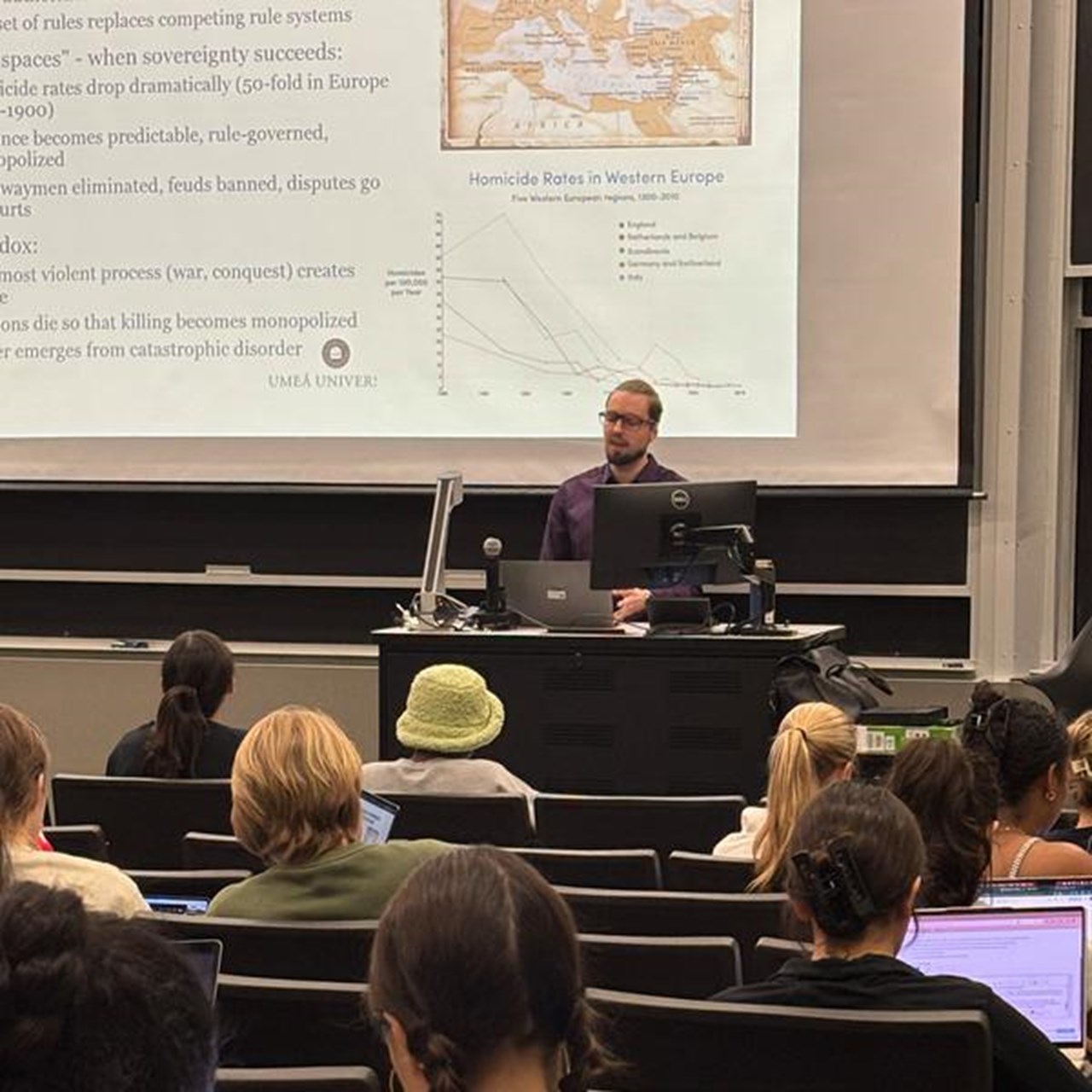 Instructor teaching a class at the University of Texas, Austin.