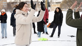 Students highfiving