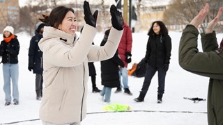 Students highfiving