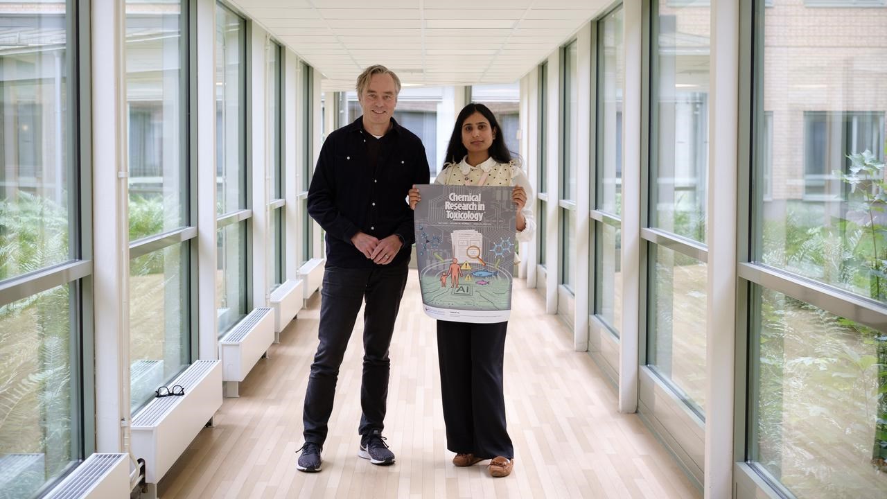 Patrik Andersson and Farina Tariq standing in a corridor