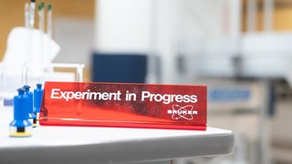 sign that say "Experiment in Progress"