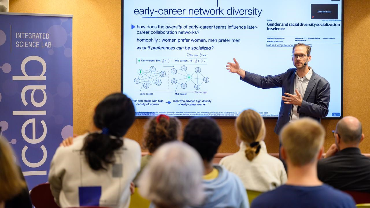A man giving a presentation to a group of people.