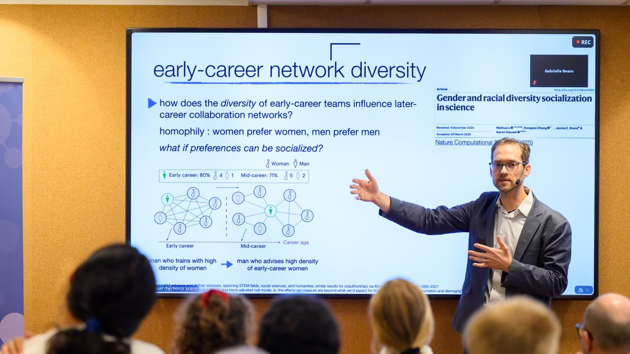 A man giving a presentation to a group of people.
