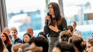Associate Professor Elin Chorell - member of the scientific committee pictured here during a discussion session with one of the presenters.