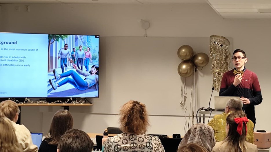 A man giving a presentation to a group of people.