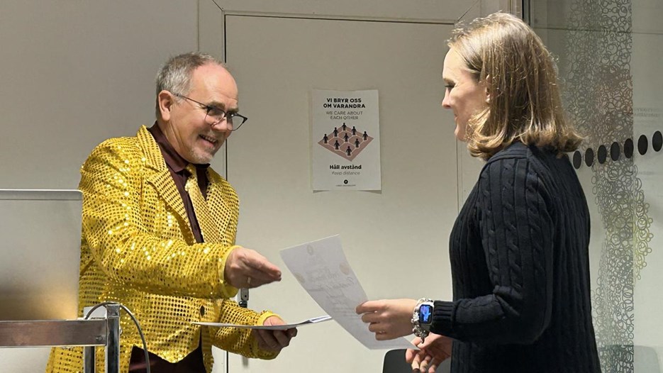 A man and a woman standing next to each other.