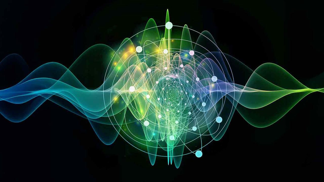 A computer generated image of particles and waves.
