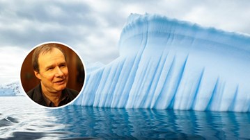 Ett isberg med en mans ansikte i mitten.