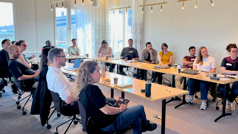 Participants listening in on lecture