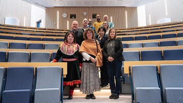 A group of people in the stairs
