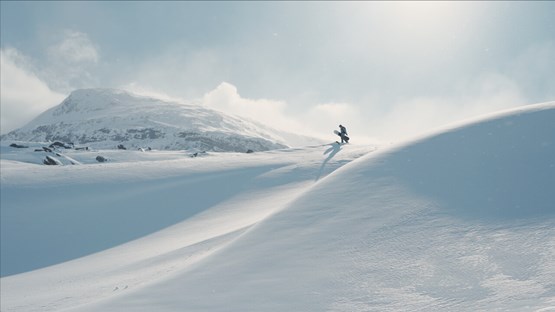 Bild av  snölandskap med några personer i fjärran. 
