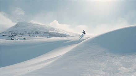 A snowboarder in the Arctic monutains in Abisko, Sweden. 