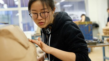 UID student at work in the lab