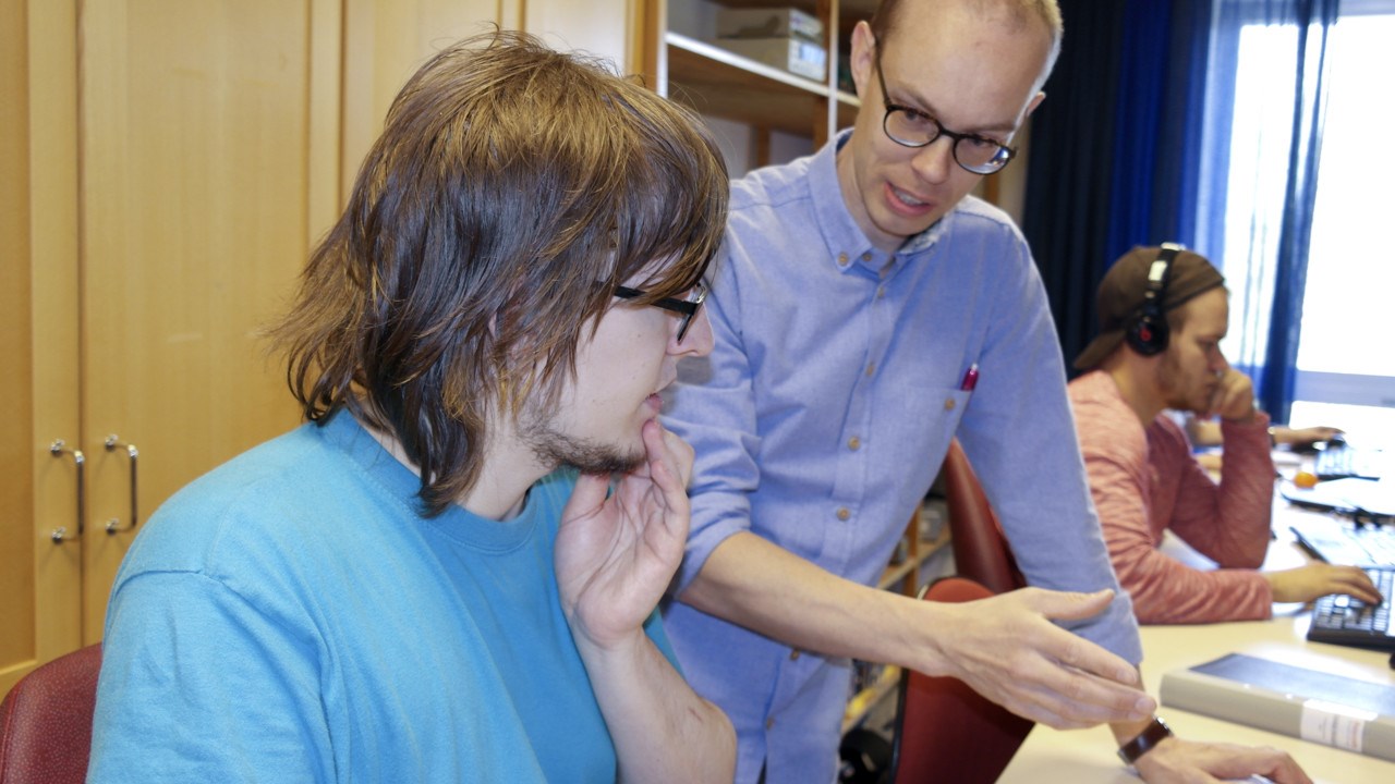 Bild på studenten Andreas Åström och läraren John Berge.