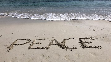Strand med text Peace 