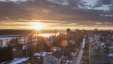 Umeå city with the river and sun in frosty landscape 