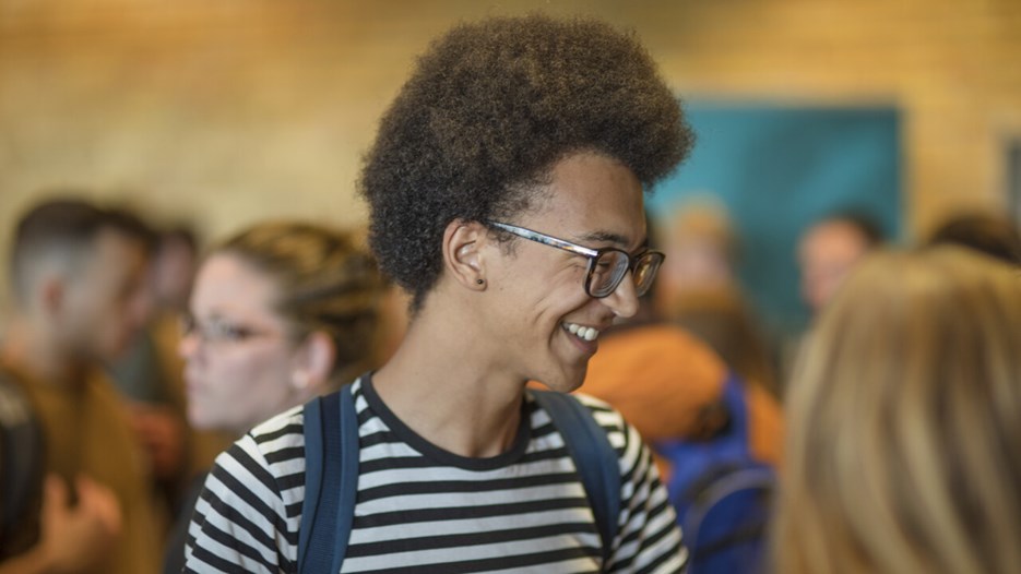 Happy smiling male student