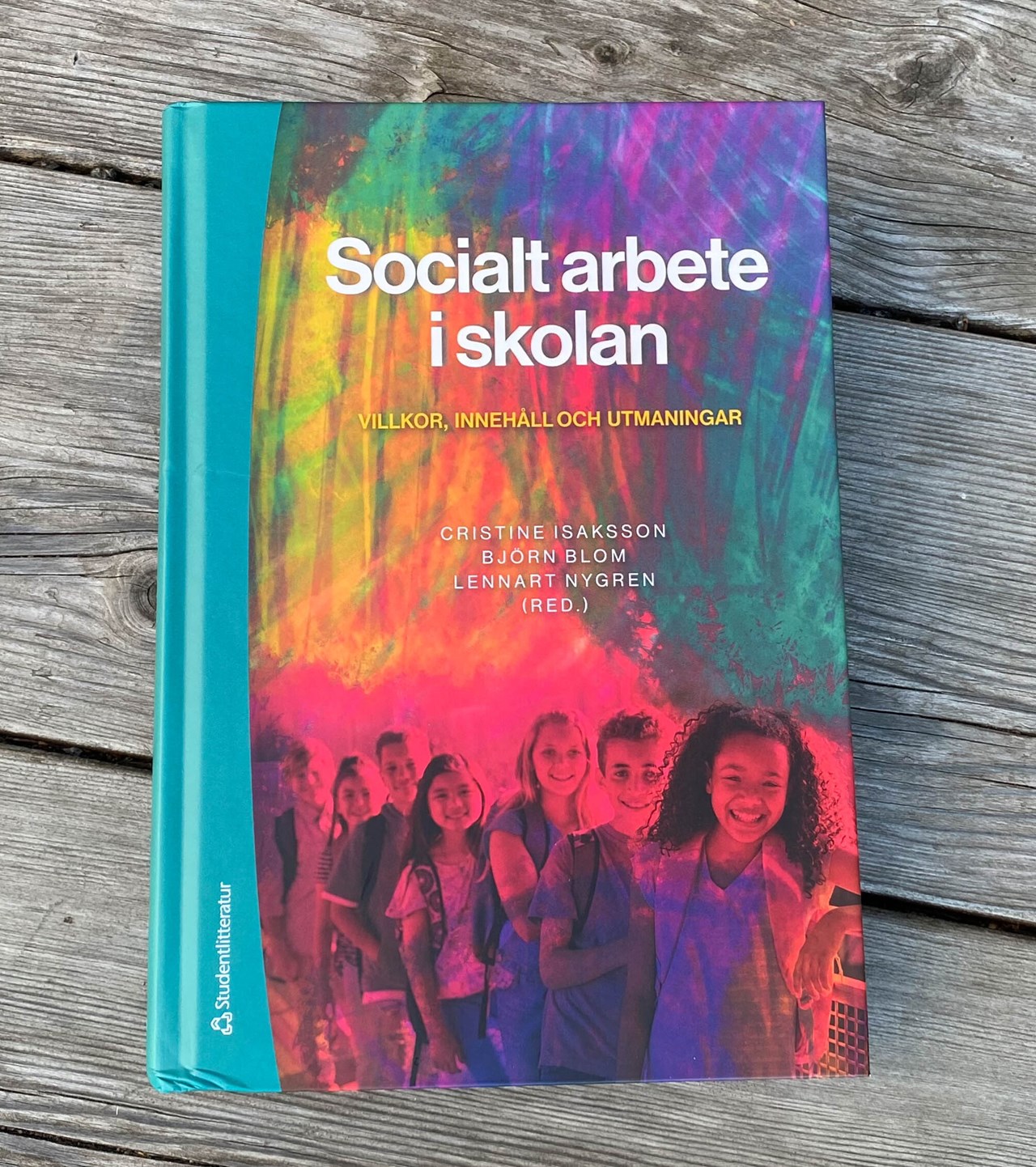 Framsida på ny bok med titeln socialt arbete i skolan - villkor, innehåll och utmaningar