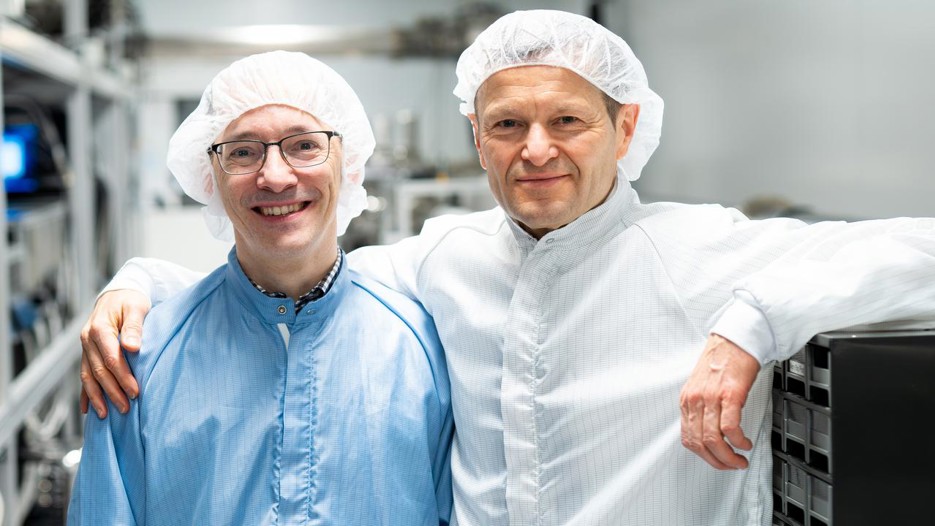 Two men in protective clothing