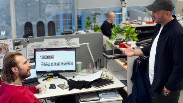 Man interacting with student