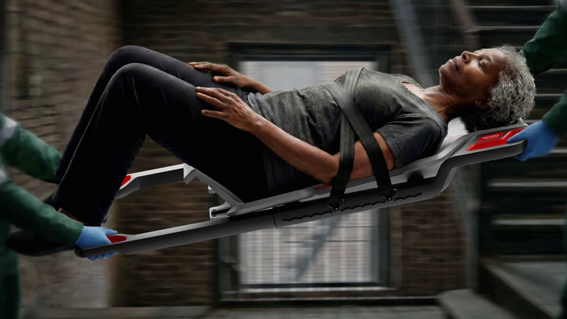A man laying on top of a chair in the air.