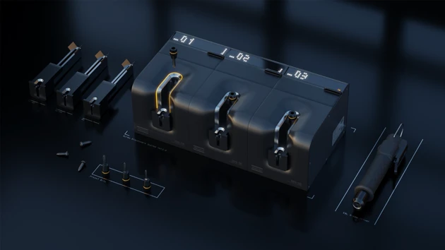 A group of metal parts sitting on top of a table.