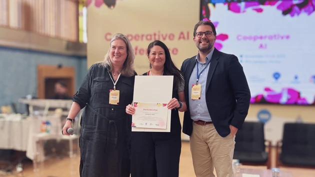 A group of people standing next to each other.