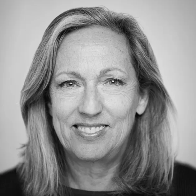 Stella in fornt of a car