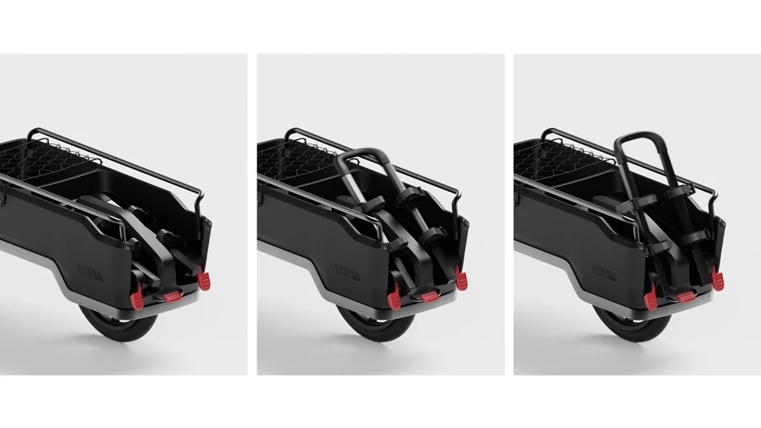 The mechanism can be folded out to attach to the kid’s bike.