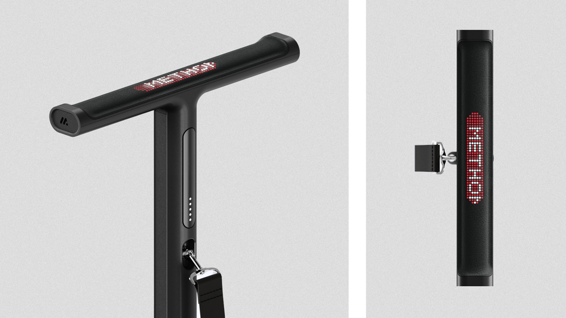Close-up of the handle and display, highlighting ergonomic features and user interface.