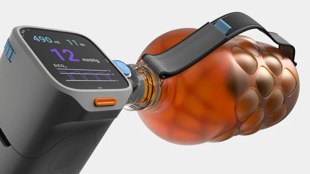 An orange water bottle with a digital screen attached to it.