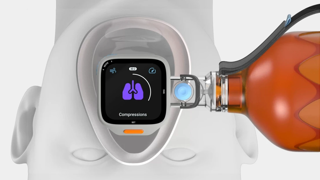 A close up of a device connected to a bottle.