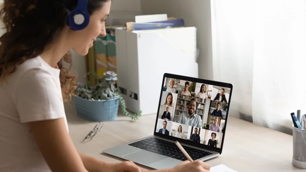 Woman attending digital meeting
