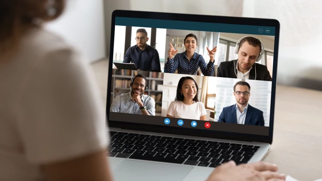 Woman attending digital meeting