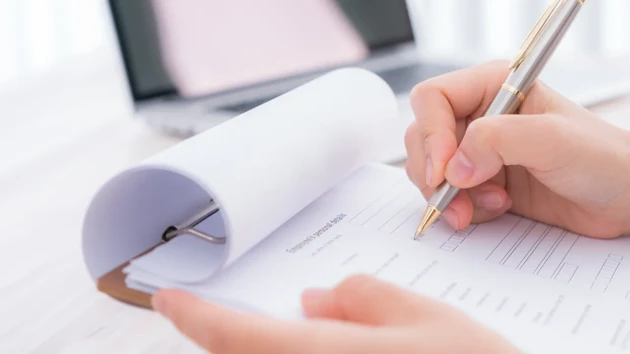 Image of checklist being filled out.