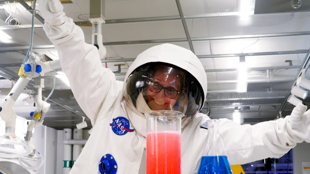 A person in a space suit.