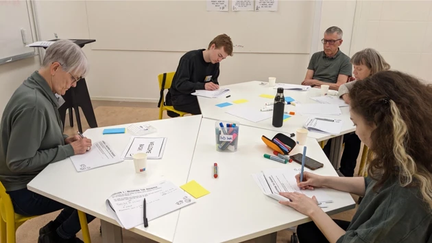Our group engaging in a concept ideation workshop.