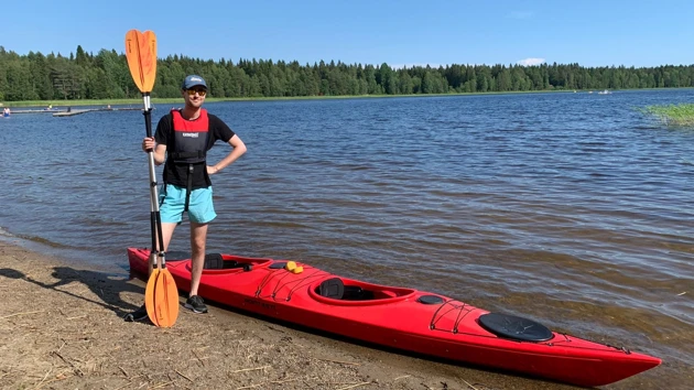 Student kayaking at Lake Nydala