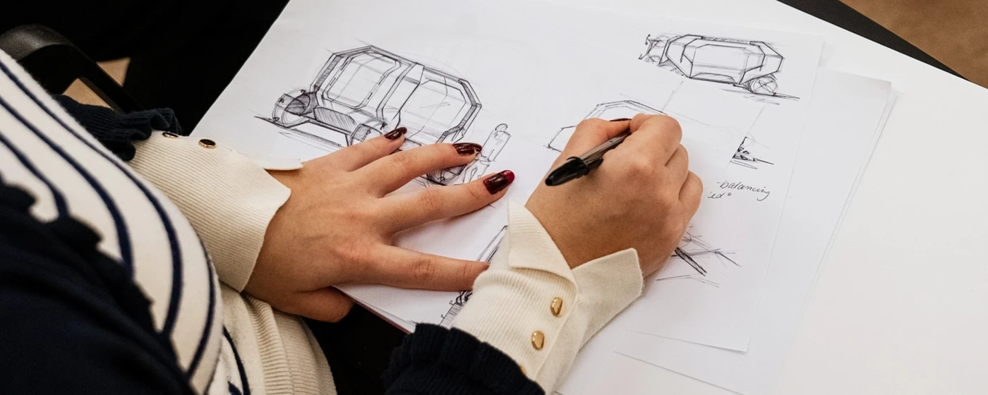 Two persons and a building in the background