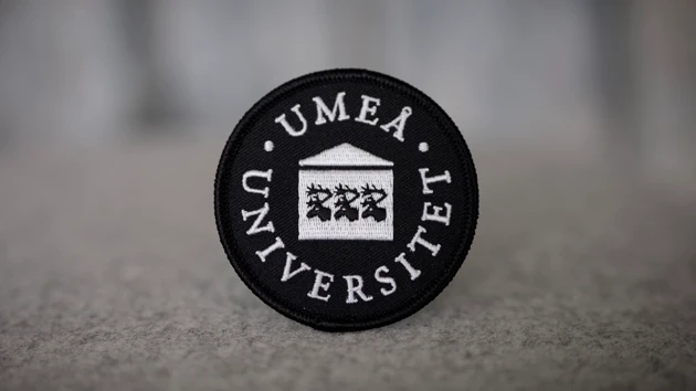 umu loggan som tygmärke